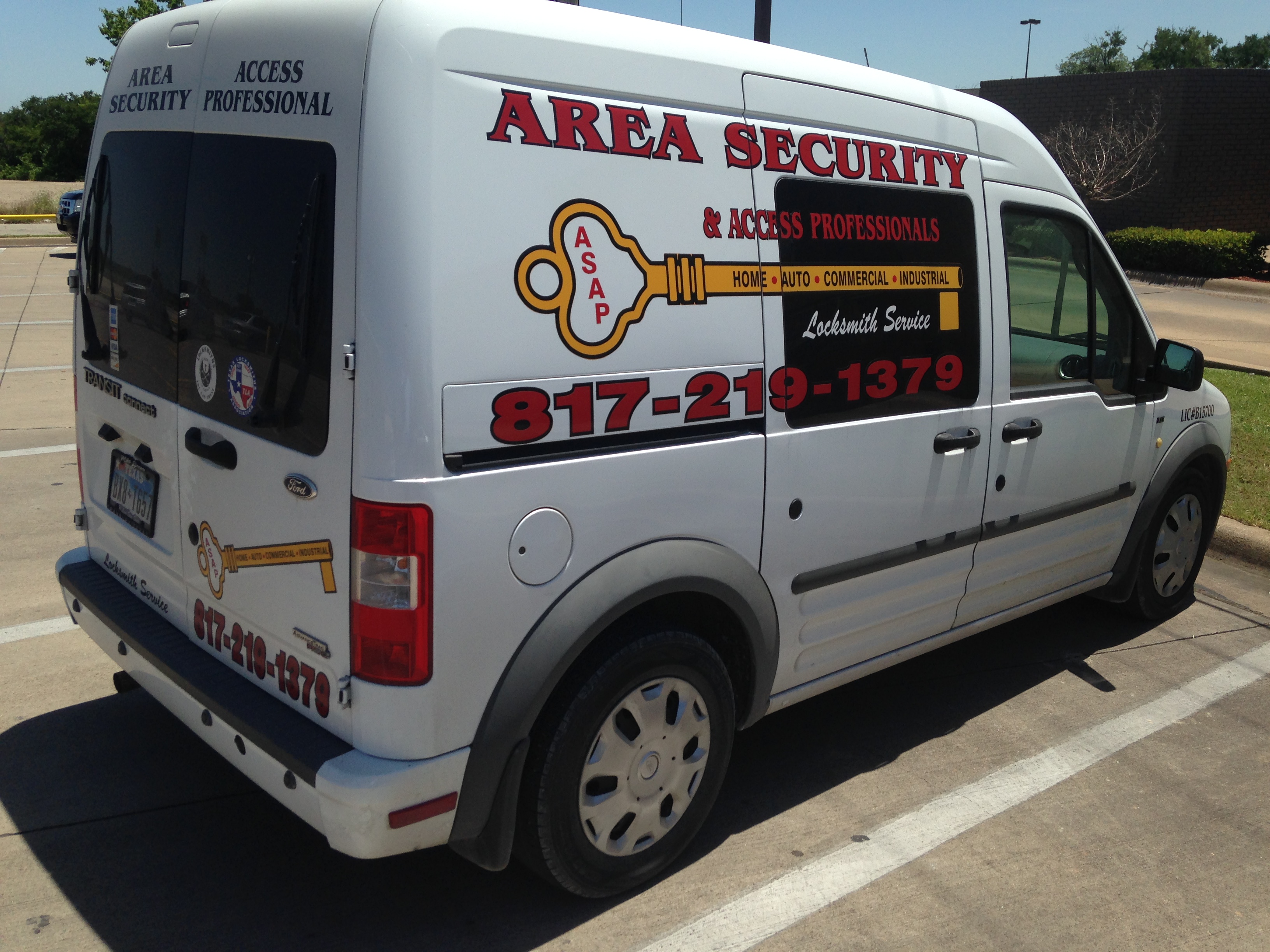 Rear view of the Area Security & Access Professionals Locksmith LLC service van with the 817-219-1379 phone number and Texas Locksmith Association decal, ready to head out to a Hood County, TX service call